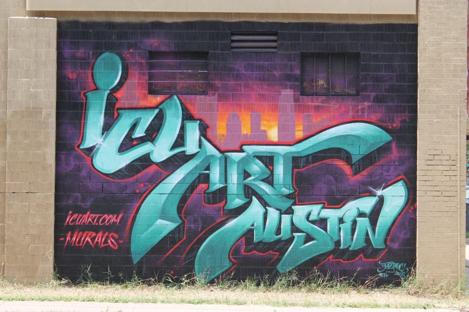 Teal graffiti mural reading Icy Art Austin Teal graffiti mural reading Icy Art Austin