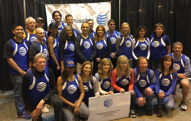 Group wearing blue shirts with AT&T logo Group wearing blue shirts with AT&T logo