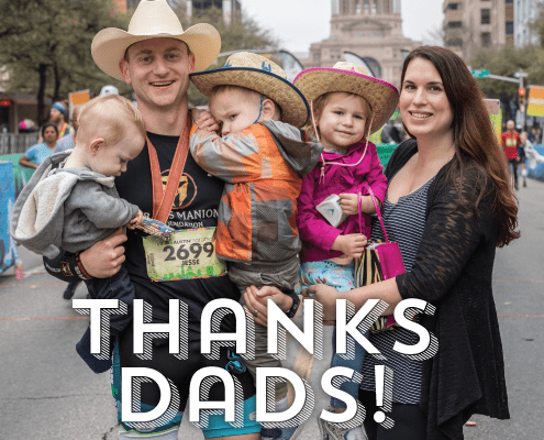 Family smiling with children, "THANKS DADS!