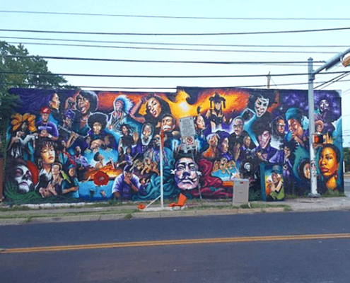 Colorful street mural collage of diverse faces Colorful street mural collage of diverse faces