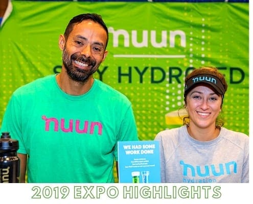 Two smiling Nuun staff at hydration expo