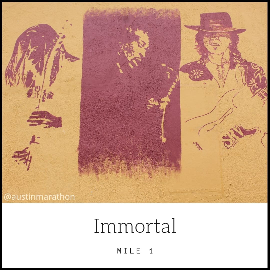 Purple mural of musicians with "Immortal" text Purple mural of musicians with "Immortal" text