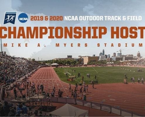 NCAA track and field stadium with crowd