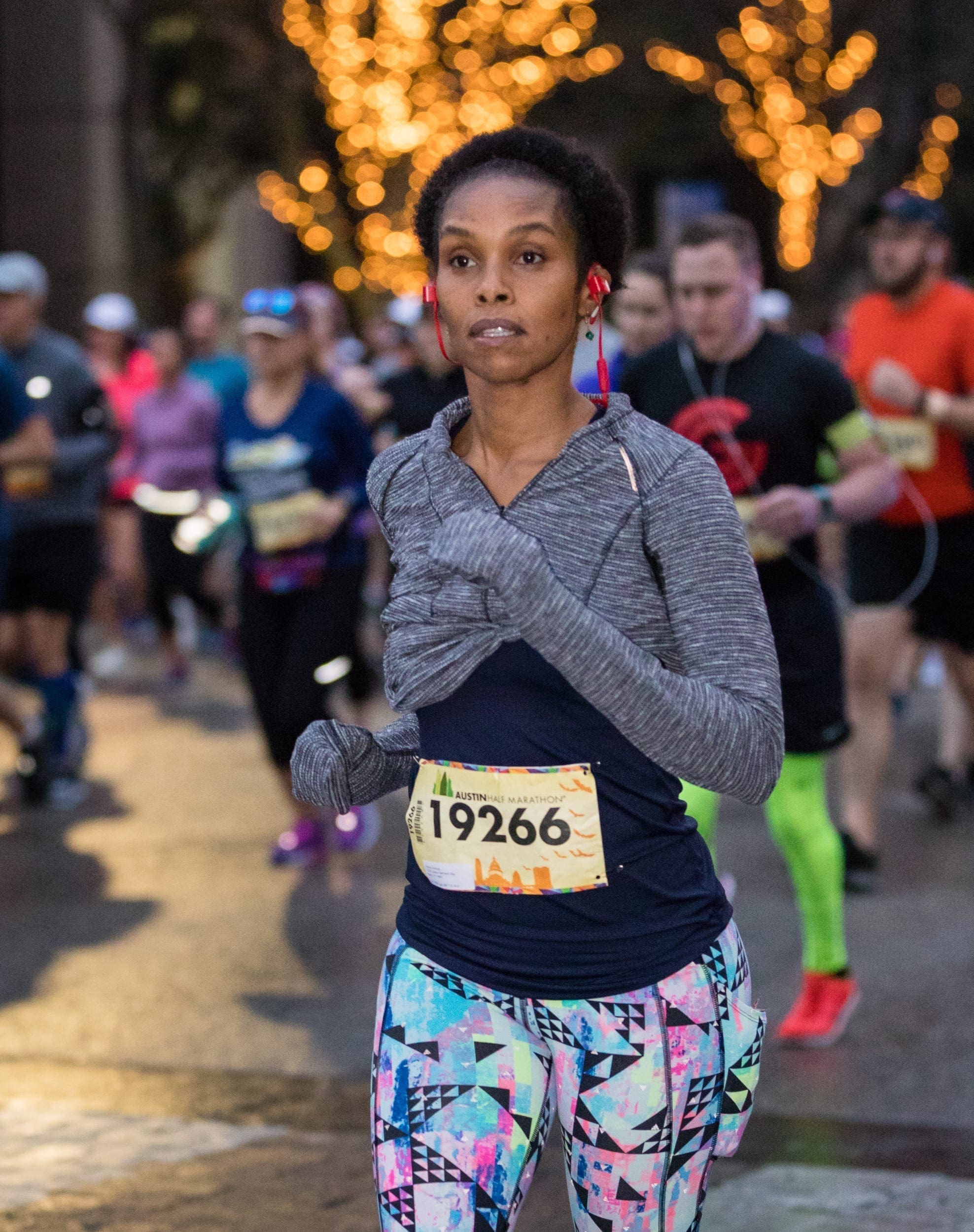 Runners wears layered clothing when running in the rain.