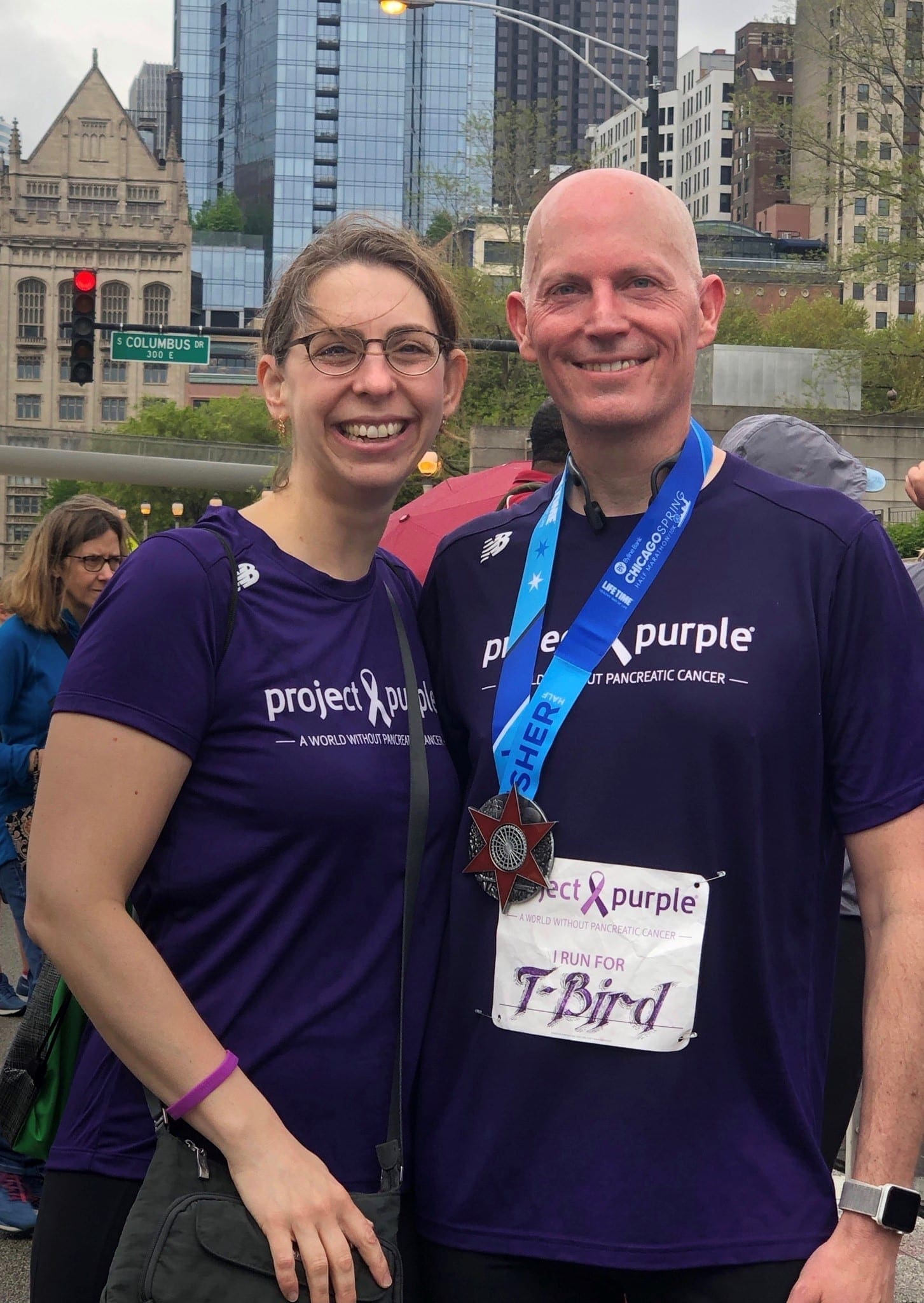 Tom and his wife, Laura, after running a race for Project Purple, a nonprofit whose mission is to find a cure for pancreatic cancer.