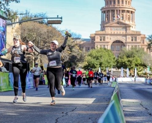 Two female participants cross the 2019 Austin Half Marathon finish line while their arms are raised in excitement. Follow these 4 taper tips to ensure you have a similar experience at the 2020 Ascension Seton Austin Marathon. Two female participants cross the 2019 Austin Half Marathon finish line while their arms are raised in excitement. Follow these 4 taper tips to ensure you have a similar experience at the 2020 Ascension Seton Austin Marathon.
