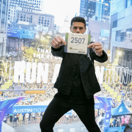 Runner holding bib number 2507 at marathon