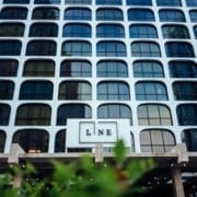 Building with “LINE” sign and arched windows Building with "LINE" sign and arched windows