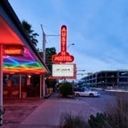 Neon-lit Austin Motel sign at dusk Neon-lit Austin Motel sign at dusk