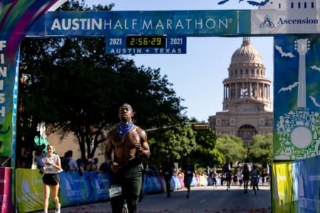 Runners finishing Austin Half Marathon by Texas Capitol