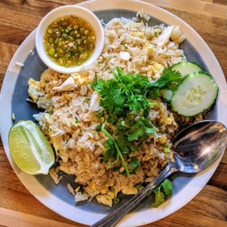 Plate of chicken fried rice with lime