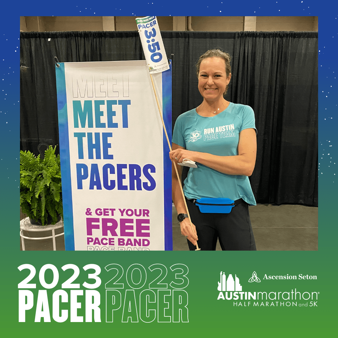 Smiling pacer holding 3:50 sign at Austin Marathon Smiling pacer holding 3:50 sign at Austin Marathon
