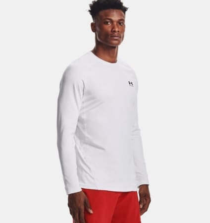 Male model in white long-sleeve shirt, red shorts Male model in white long-sleeve shirt, red shorts