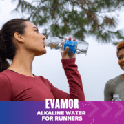 Woman drinking Evamor alkaline water outdoors