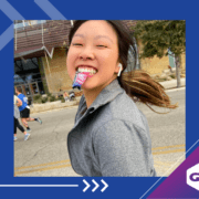 Runner smiling with energy gel in mouth