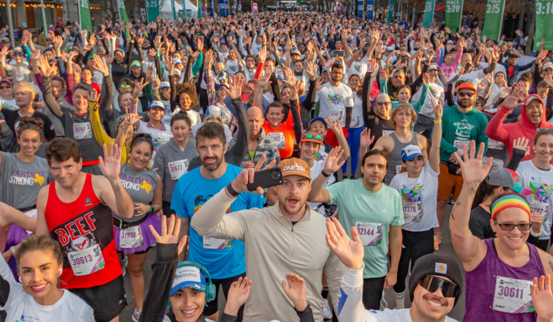 Crowd of runners at Austin Marathon start