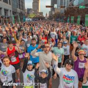 Crowd of runners at Austin Marathon start