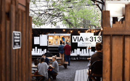 VIA 313 pizza truck with outdoor diners VIA 313 pizza truck with outdoor diners
