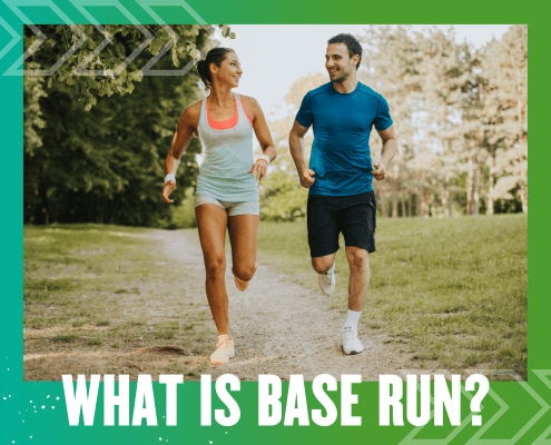 Smiling couple running on park trail