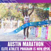 Runner crossing Austin Marathon finish line