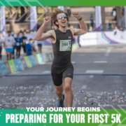 Runner celebrating crossing 5K finish line