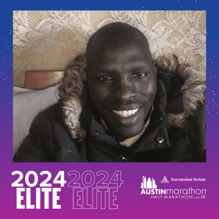 Person smiling in fur-hooded coat, Austin Marathon frame