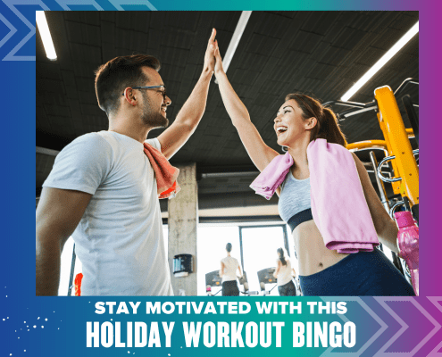 Man and woman high-fiving at gym