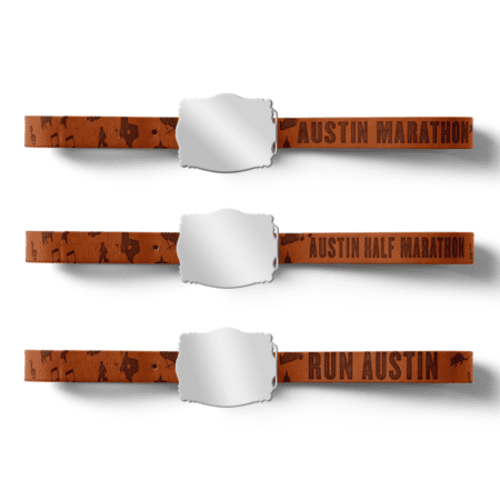 Three Austin marathon medal ribbons