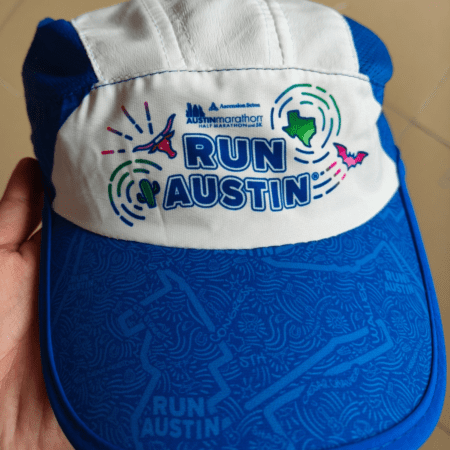 Blue and white "Run Austin" running cap