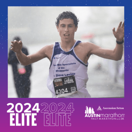 Runner finishing Austin marathon in rain