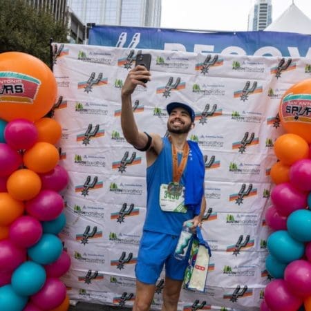 Runner taking selfie at race finish
