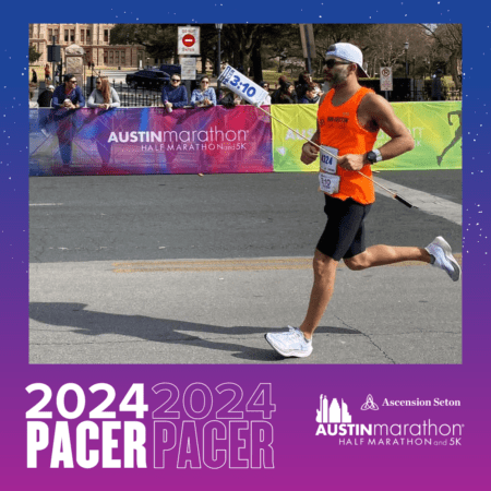 Pacer running in orange at 2024 Austin Marathon