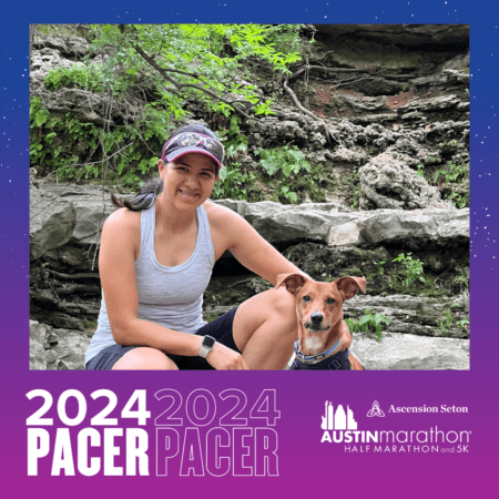 Austin Marathon pacer with dog on rocks