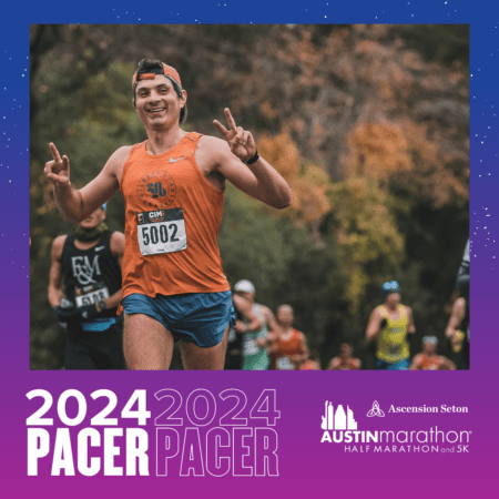 Smiling pacer runner in orange shirt