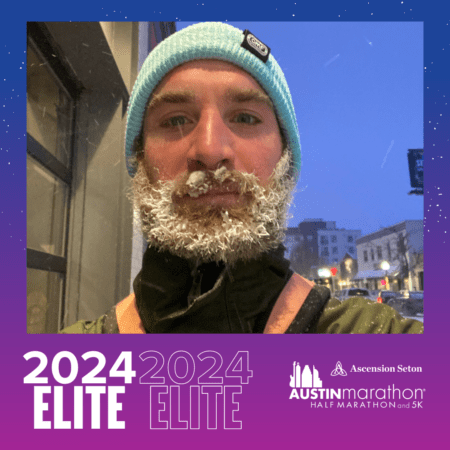 Runner with frost-covered beard and blue beanie
