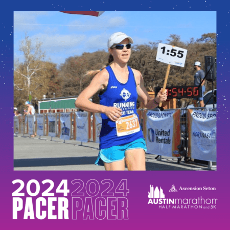 Runner pacer holding 1:55 sign