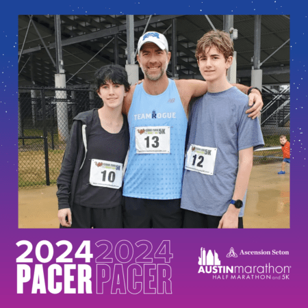 Three runners posing at Austin Marathon pacer