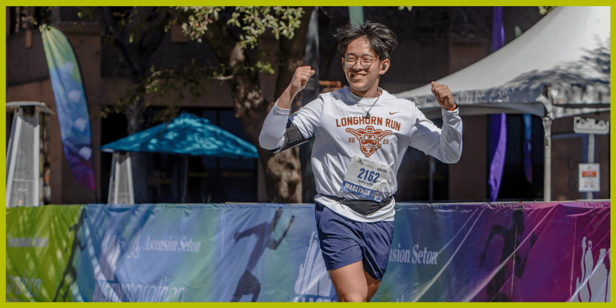 Smiling runner celebrating at Longhorn Run Smiling runner celebrating at Longhorn Run