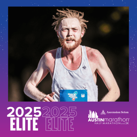 Bearded runner in white singlet racing Bearded runner in white singlet racing