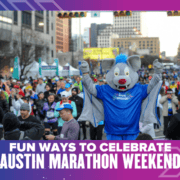 Blue mascot cheering amid Austin Marathon crowd