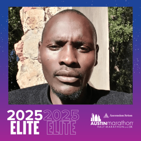 Close-up portrait of man with Austin Marathon banner Close-up portrait of man with Austin Marathon banner