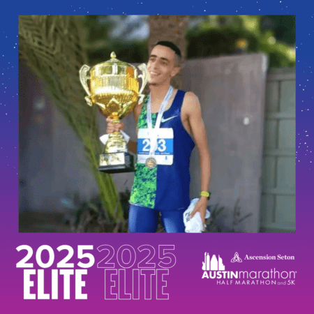 Athlete holding large trophy and medal Athlete holding large trophy and medal