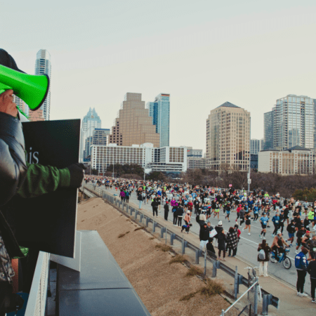 City marathon with cheering spectators City marathon with cheering spectators