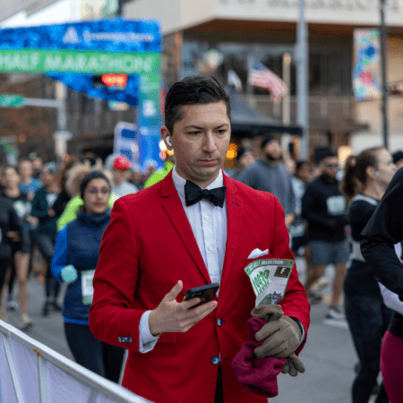 Man in red blazer at marathon start Man in red blazer at marathon start