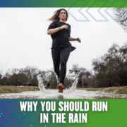 Woman running through puddle in the rain