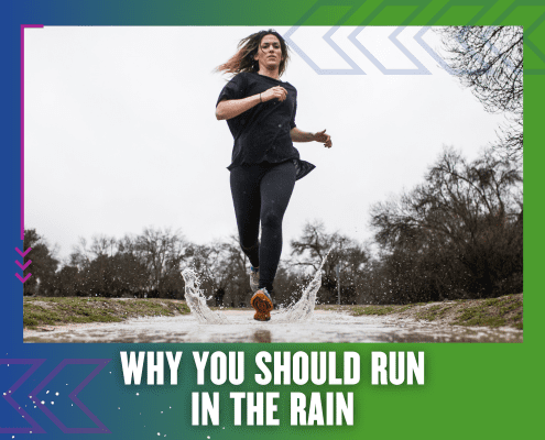 Woman running through puddle in the rain