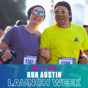 Two smiling runners at Run Austin event
