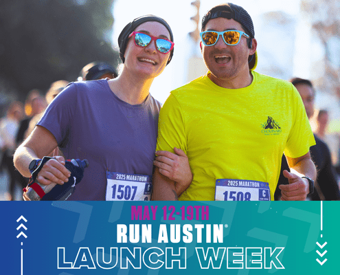 Two smiling runners at Run Austin event