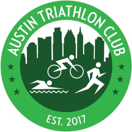 Green circular logo for Austin Triathlon Club with city skyline silhouette, icons of swimming, cycling, and running—perfect for those seeking Austin running groups or free group runs. "Austin Triathlon Club" tops the logo, with "Est. 2017" at the bottom. Austin Marathon Half Marathon & 5K Green circular logo for Austin Triathlon Club with city skyline silhouette, icons of swimming, cycling, and running—perfect for those seeking Austin running groups or free group runs. "Austin Triathlon Club" tops the logo, with "Est. 2017" at the bottom. Austin Marathon Half Marathon & 5K