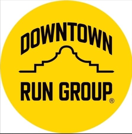 Yellow circle logo with "DOWNTOWN RUN GROUP" in bold black letters. "DOWNTOWN" arches above a stylized building outline, with "RUN GROUP" below—perfect for Austin running groups and free group runs. Austin Marathon Half Marathon & 5K Yellow circle logo with "DOWNTOWN RUN GROUP" in bold black letters. "DOWNTOWN" arches above a stylized building outline, with "RUN GROUP" below—perfect for Austin running groups and free group runs. Austin Marathon Half Marathon & 5K